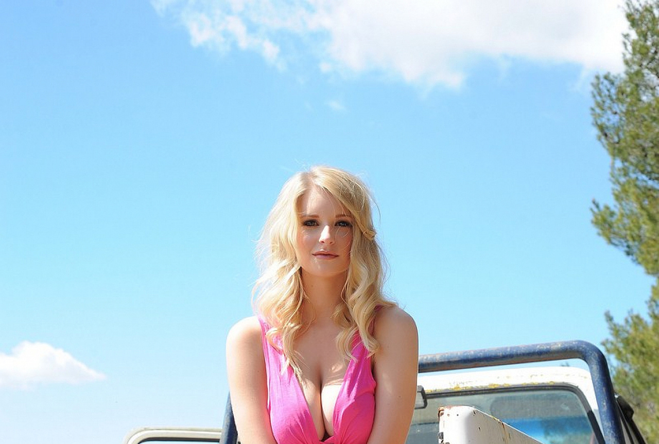 Pink top and denim shorts on the truck