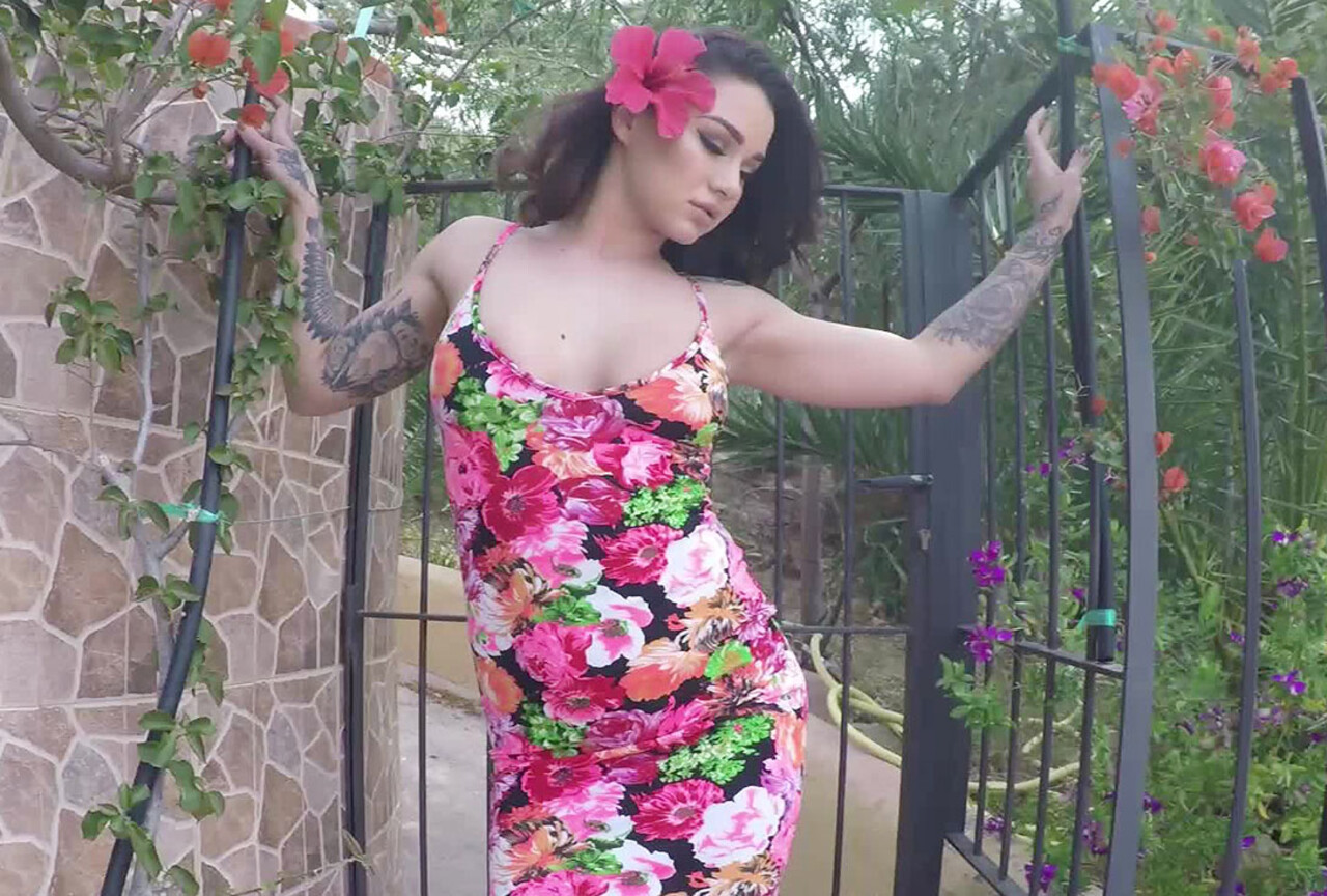 Mica strips from her sexy floral dress
